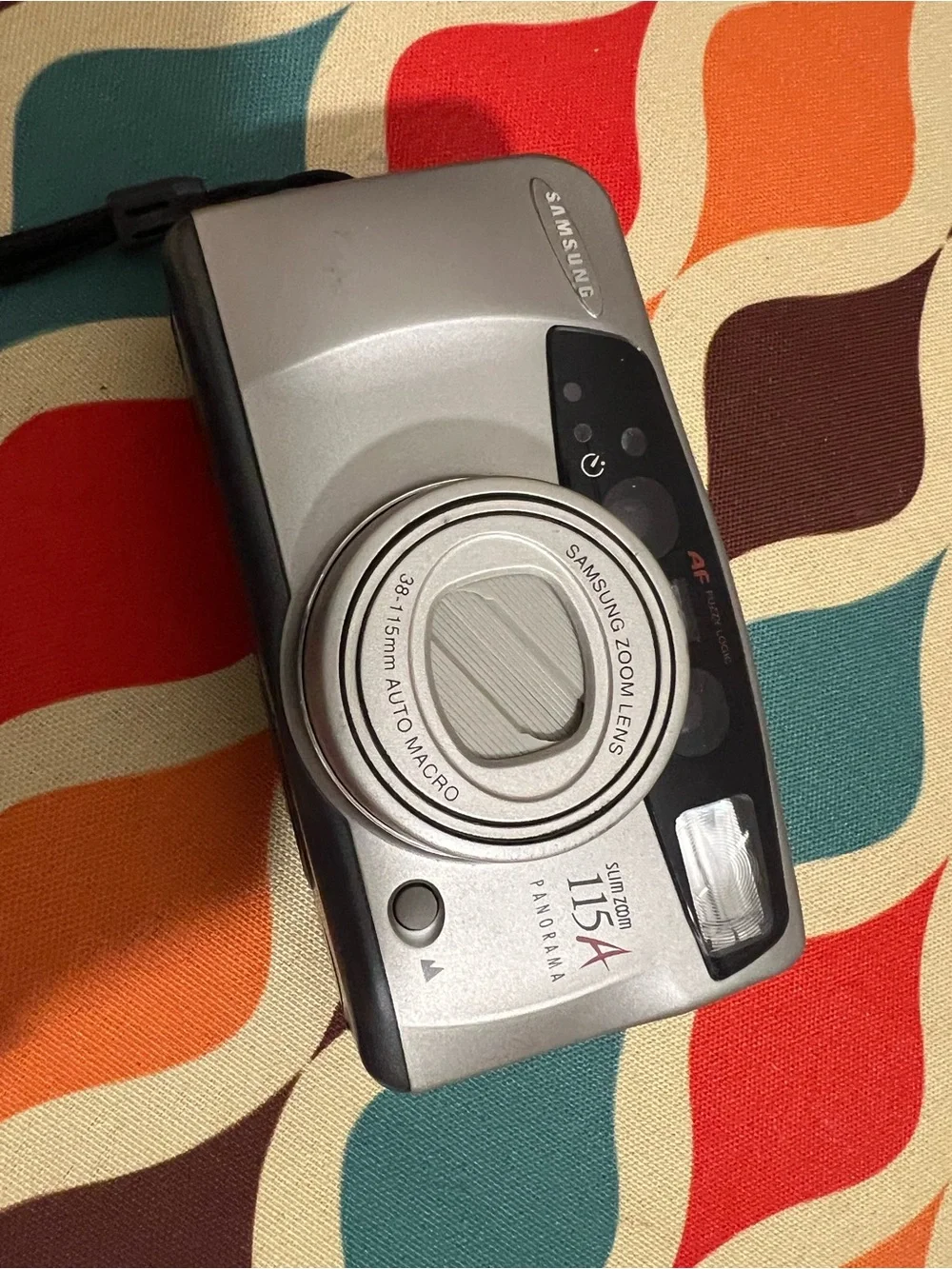 Vintage Samsung Slim Zoom 115A Panorama 35mm film camera with a 38-115mm lens
